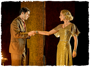 An actor holding anothers hand.