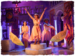 Dance number with gold sparkly umbrellas