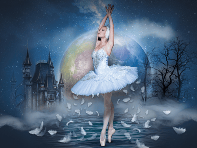 A ballet dancer in a white ballet outift and white ballet shoes raises her arms in front of a blue floor littered with white feathers