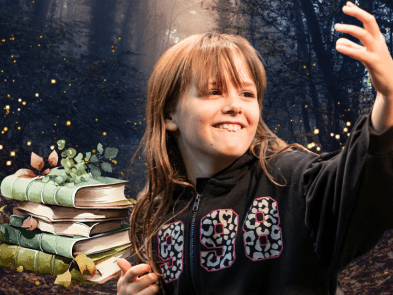 A stack of magical books in behind a performing child