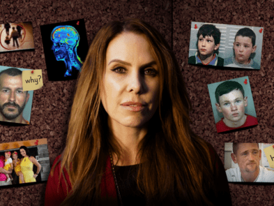 A serious-looking woman stands in front of a corkboard covered with pinned photos and notes, including pictures of men, children, a family, a brain scan, and sticky notes with questions like “why?” and “how?”. The scene evokes a true-crime investigation board.