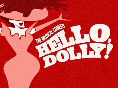 Red background with pink illustration of a woman. She is wearing a dress and a big hat, but her eyes are obscured. Her  mouth is the shape of a heart. There is white text that reads 'The Musical Comedy'  Hello, Dolly! and the font is vintage style